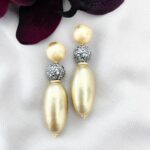 Gold-cotton-pearl-en-markasiet-oorbellen